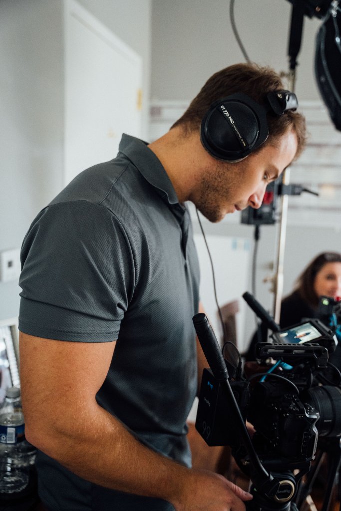 McCoy Visuals production team managing audio and video equipment on a live shoot