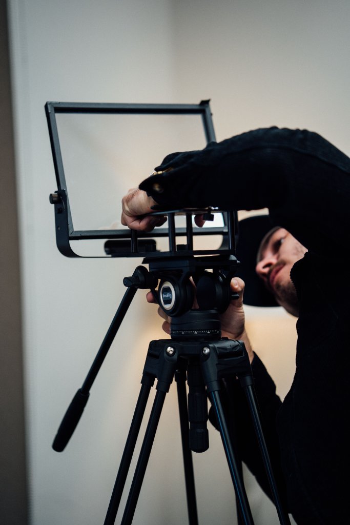 McCoy Visuals camera operator framing a cinematic shot during a commercial production