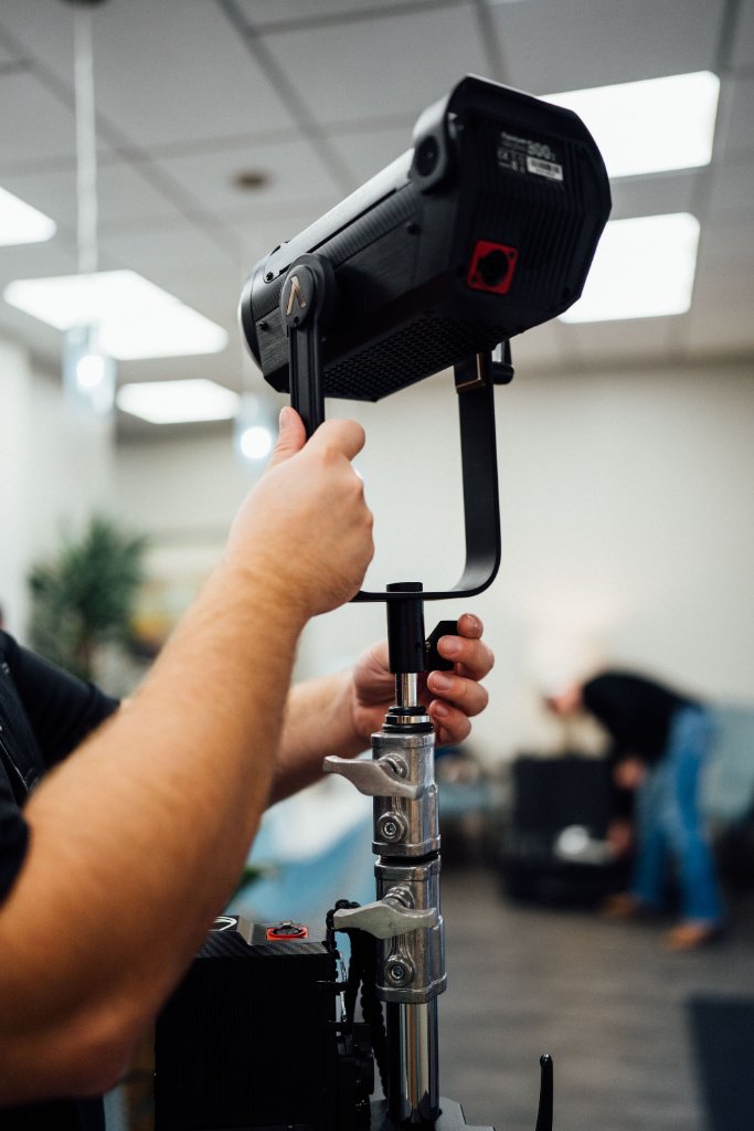 McCoy Visuals crew reviewing playback footage during a professional brand video session