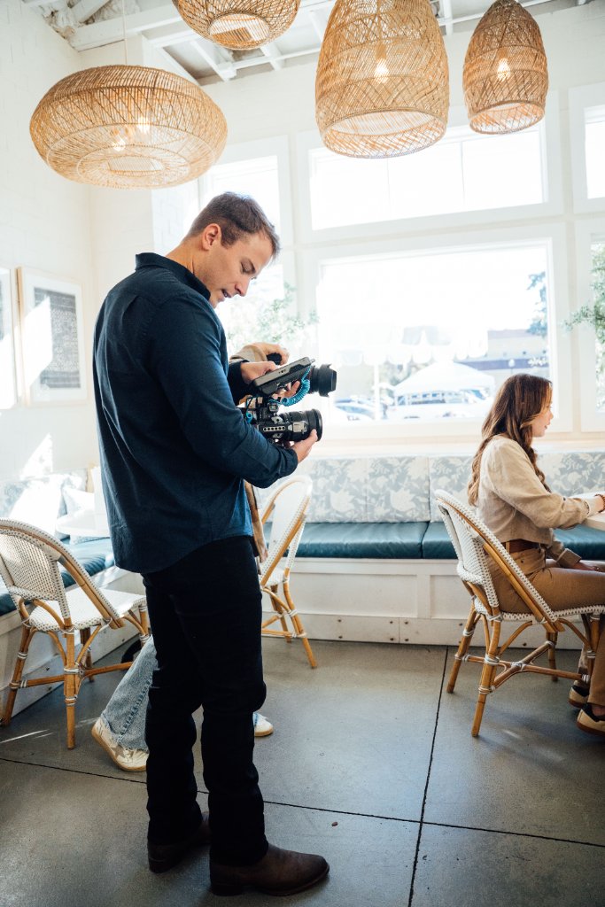 Professional video production crew from McCoy Visuals preparing equipment for a commercial shoot