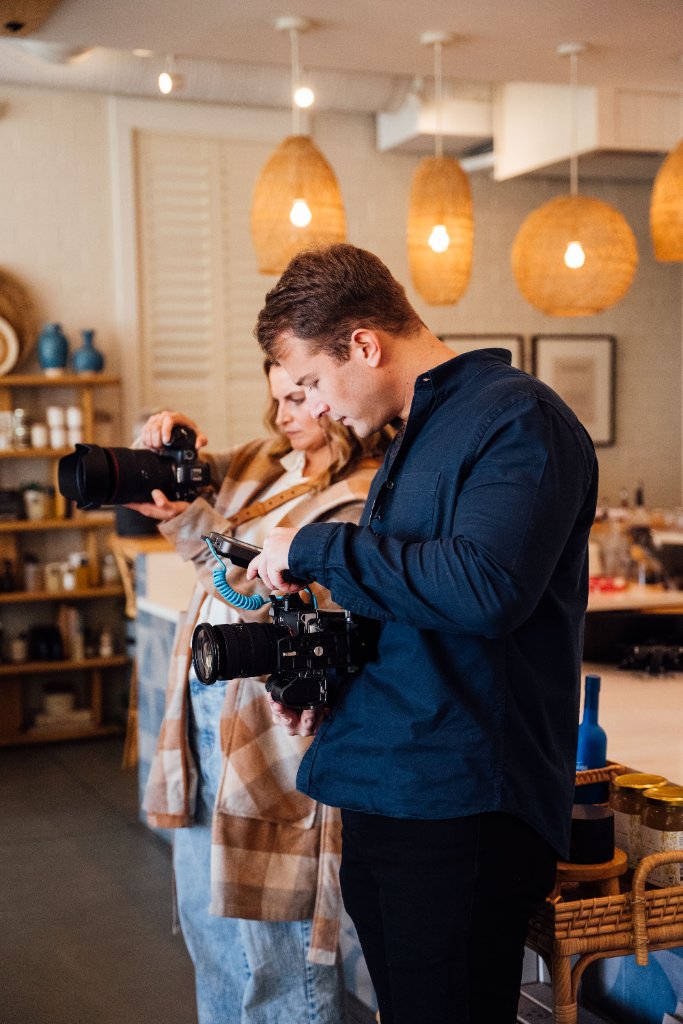 McCoy Visuals behind the scenes – creative team collaborating on a brand storytelling project