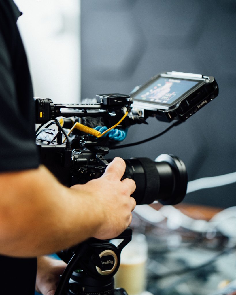 Professional video production crew from McCoy Visuals preparing equipment for a commercial shoot