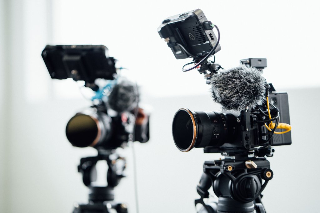 McCoy Visuals filmmaker operating cinema camera on location for a Gulf Coast brand