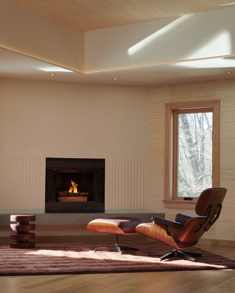 Primary suite sitting area with fireplace