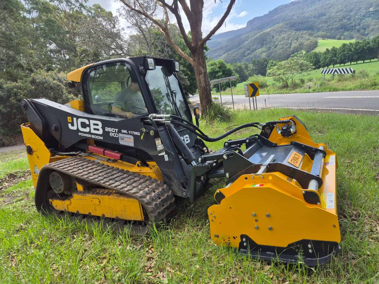 JCB 260T tracked loader with flail mower attachment