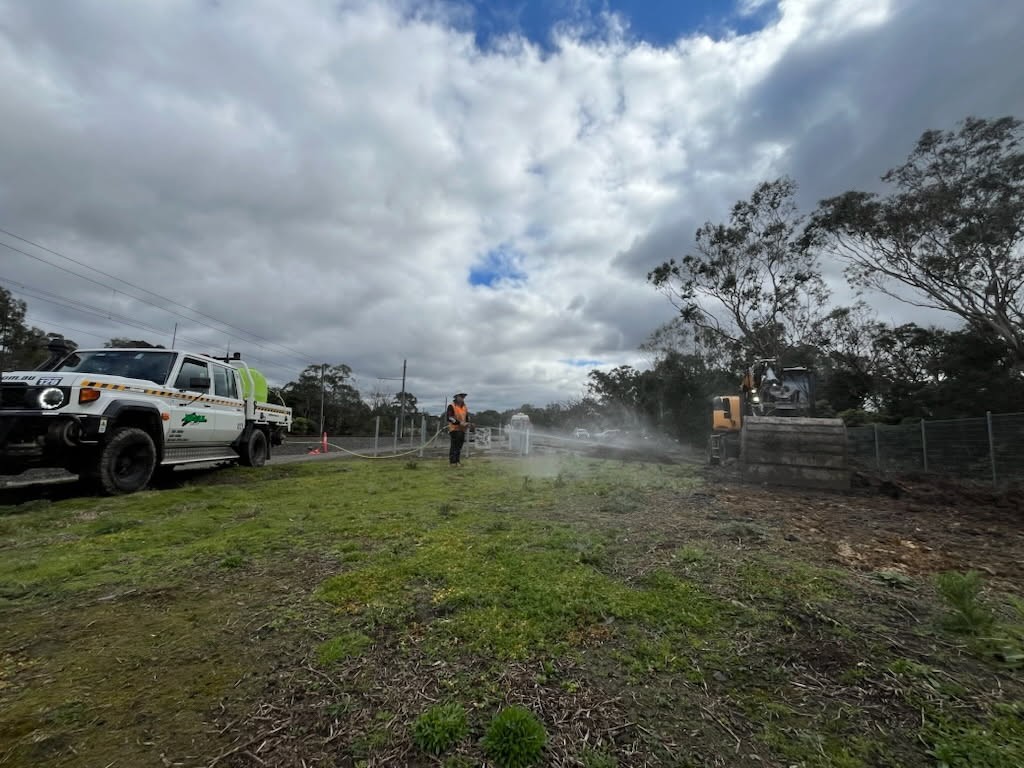 Weed spraying and support works beside the track
