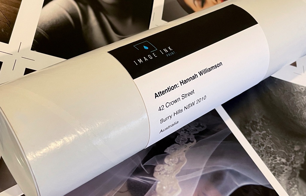 Prints packed in a 90mm solid white mailing tube with acid-free glassine interleaving