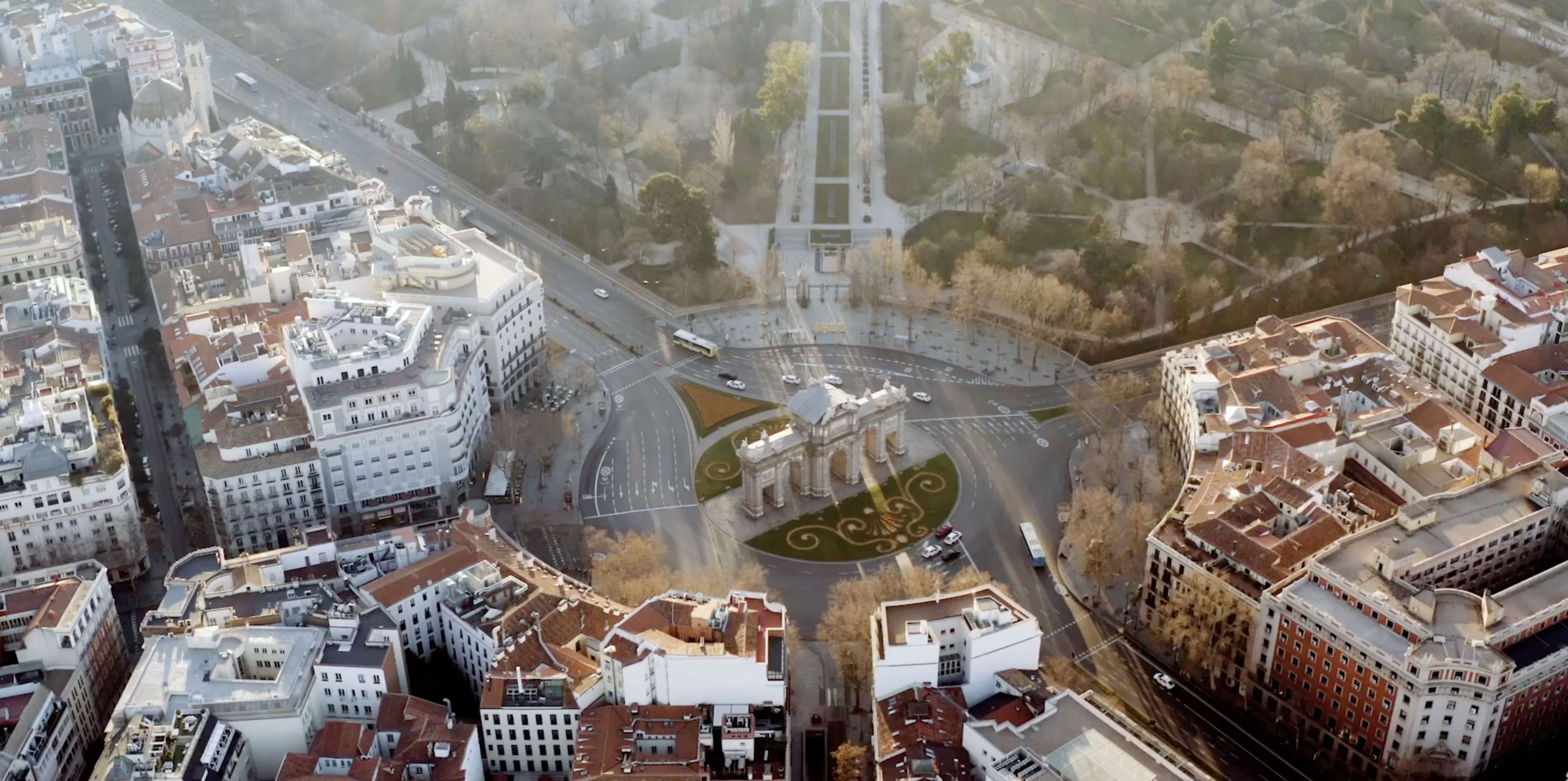 The Four Seasons Hotel Madrid facade beneath a pale sky