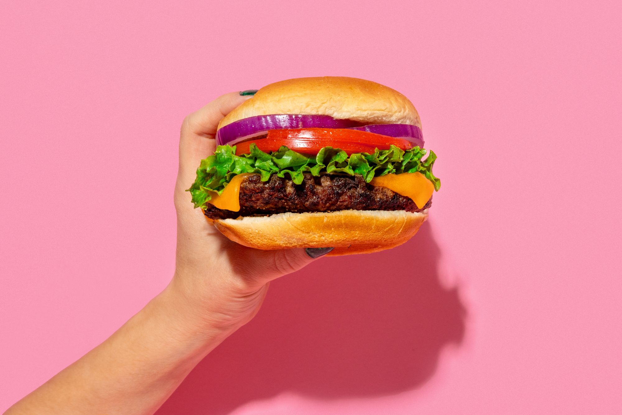 Studio food photography of a cheeseburger by Tanner+West