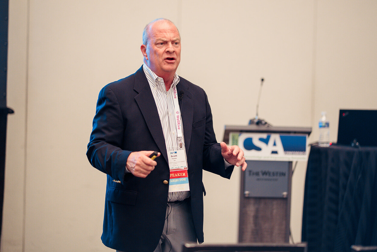 Scott Fischer with fellow senior care professionals at a national conference