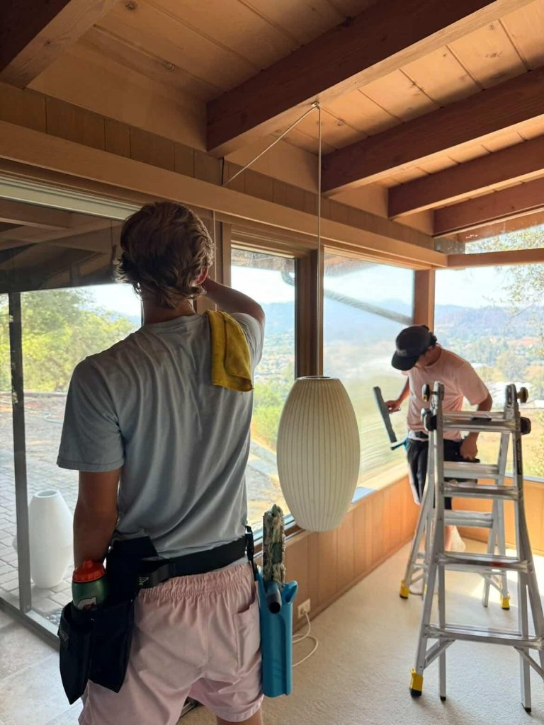 Team cleaning windows