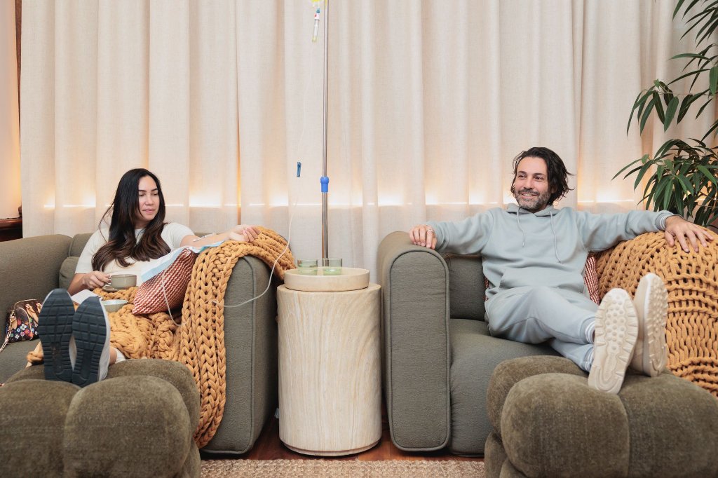 Clients relaxing during IV therapy at Utopiya Lounge