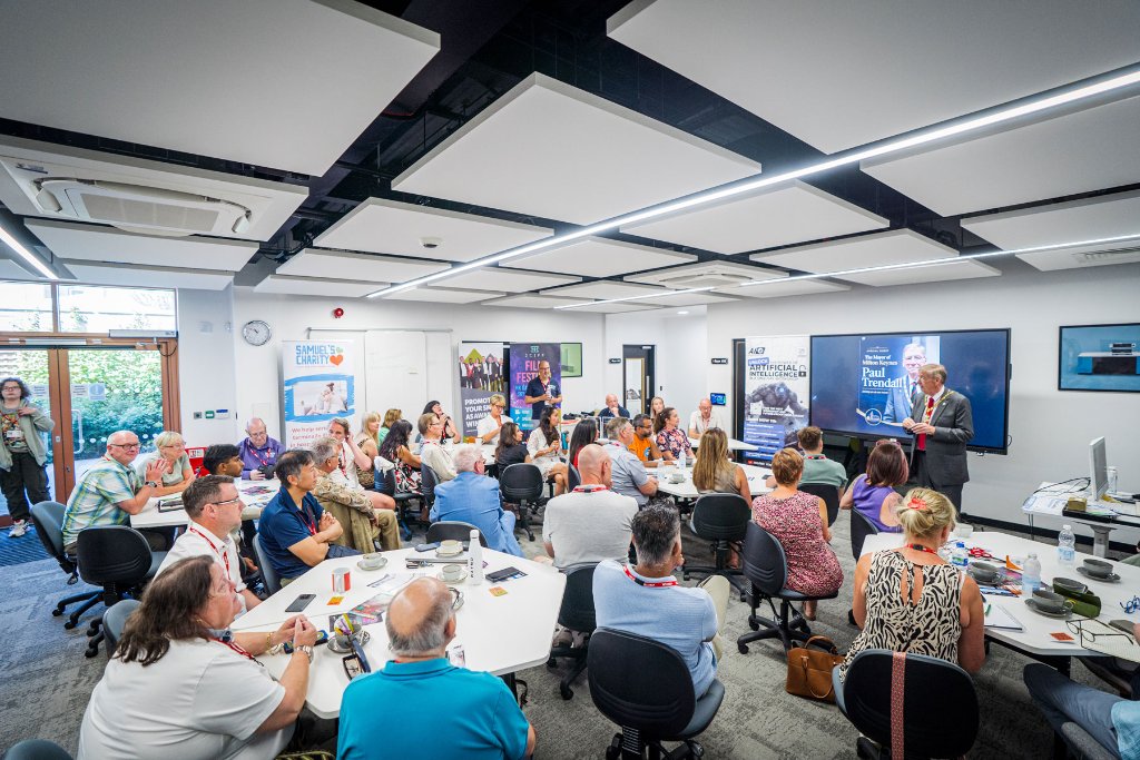 Wide view of the full room during the Mayor's talk