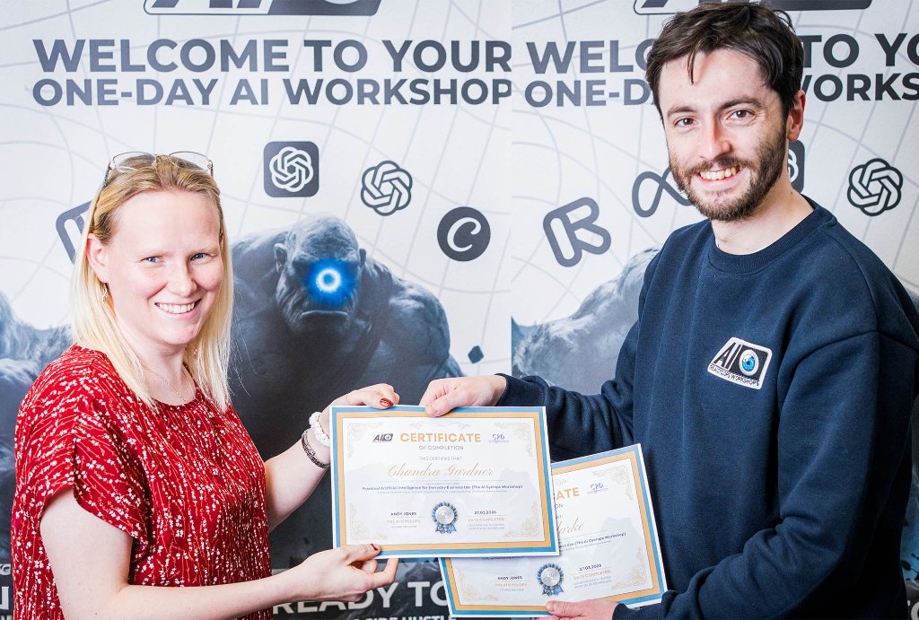 Trainer helping attendee with AI