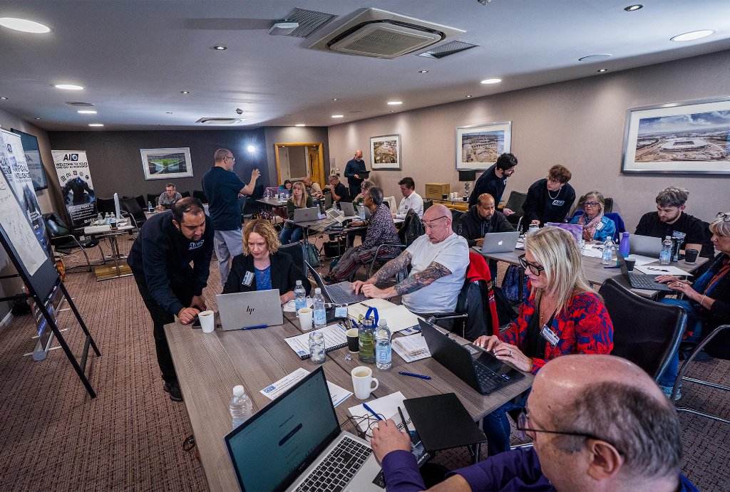 Attendee working on social media content with ChatGPT