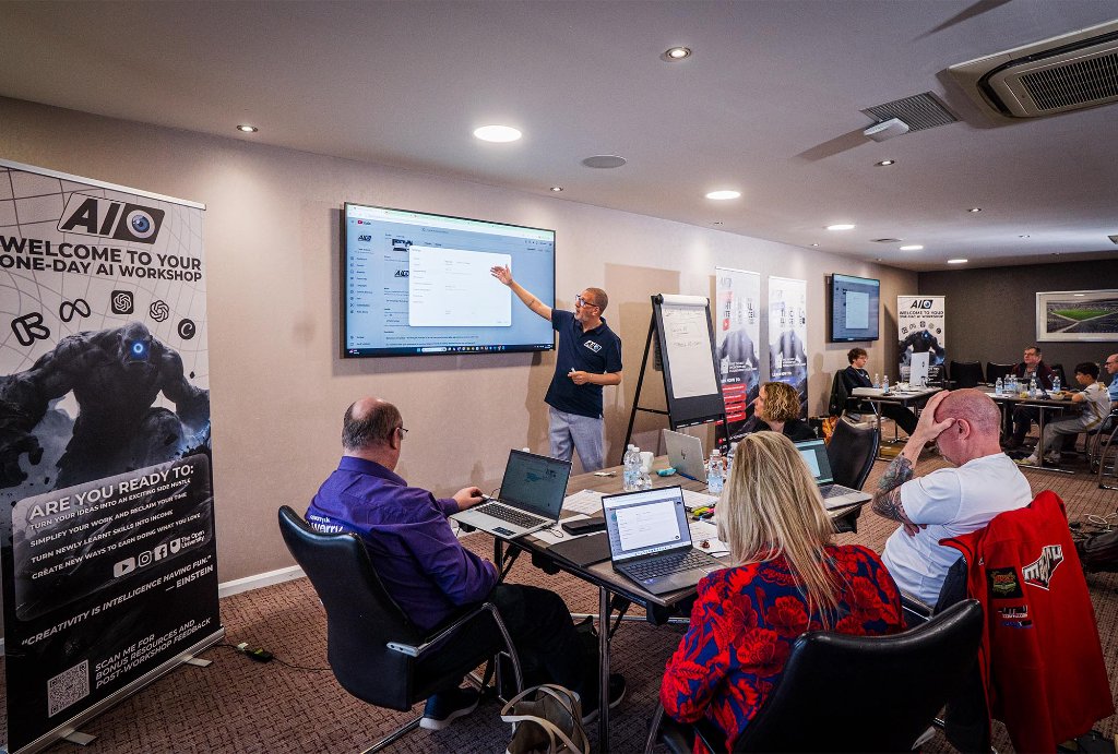 Wide view of marketing workshop with trainer presenting to full room