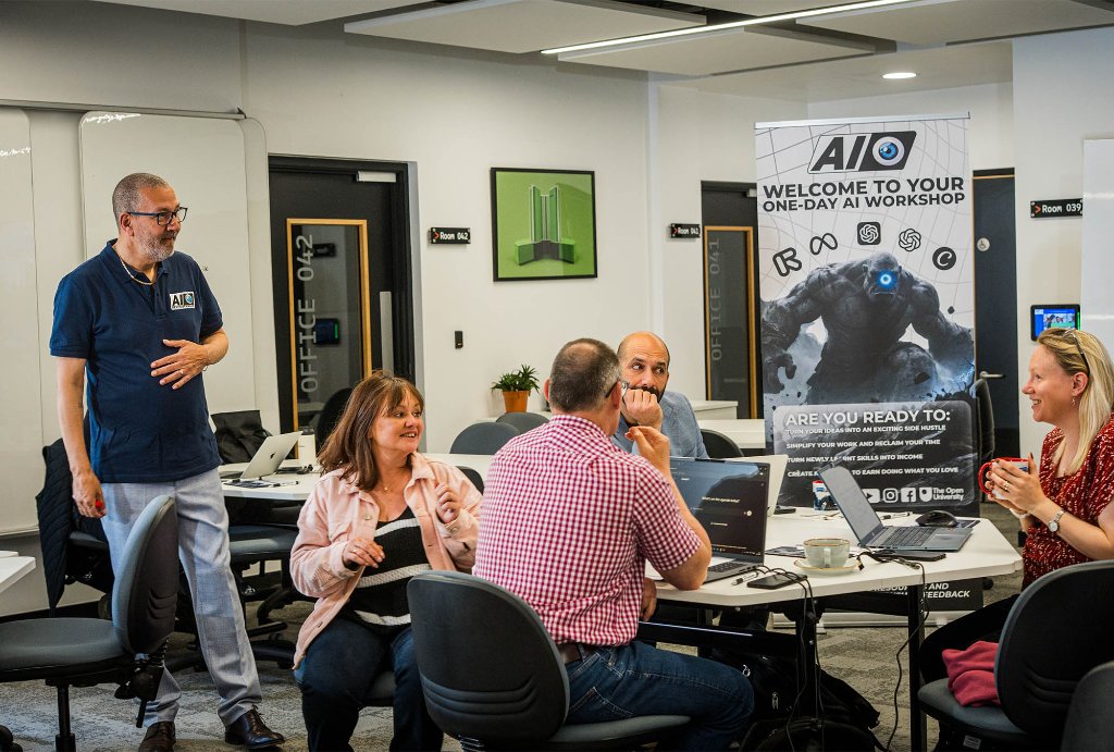 Workshop attendee smiling while learning AI alongside a member of the AI Cyclops team