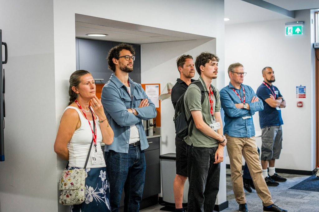 Attendees listening during a talk