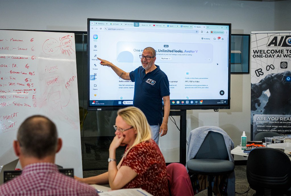 Group workshop engaged with AI screen