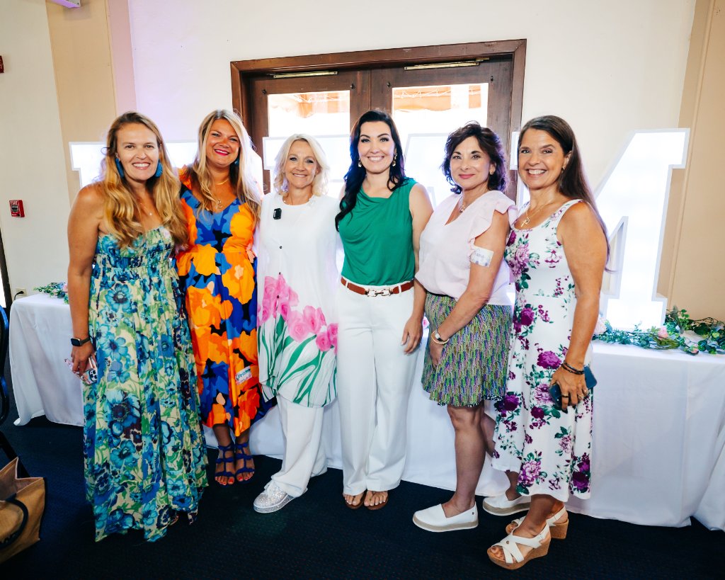 Women posing together indoors