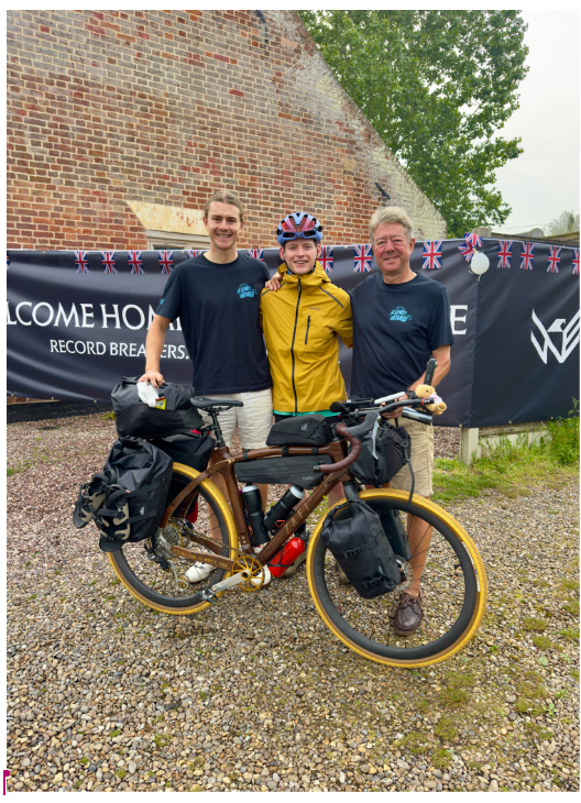 Tom welcomed home with his family after the world record