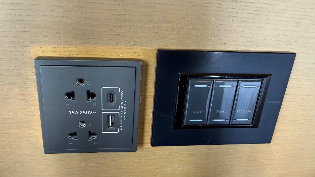 Bedside power panel - universal socket, USB-C and room lighting controls