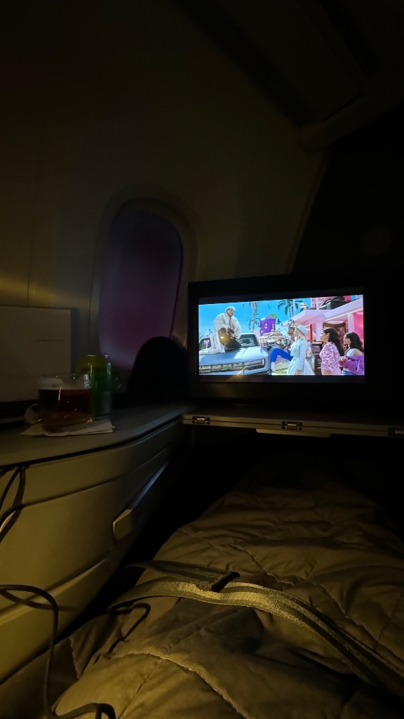 Bed made up with Casper bedding — a genuine highlight of both flights
