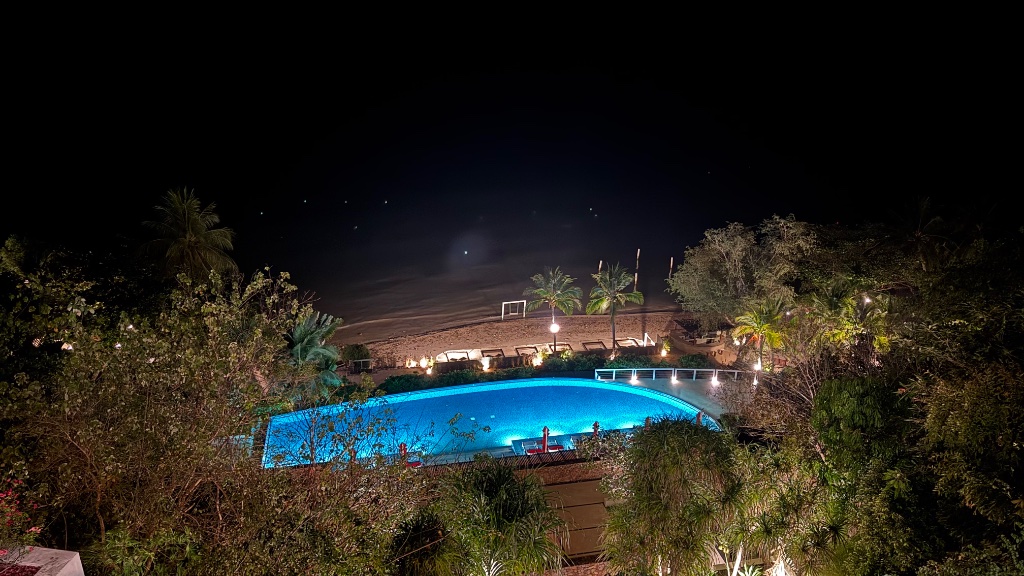 The main pool at night lit from within