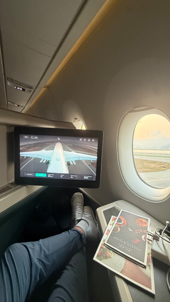 Touchdown into Hong Kong — runway camera on the IFE
