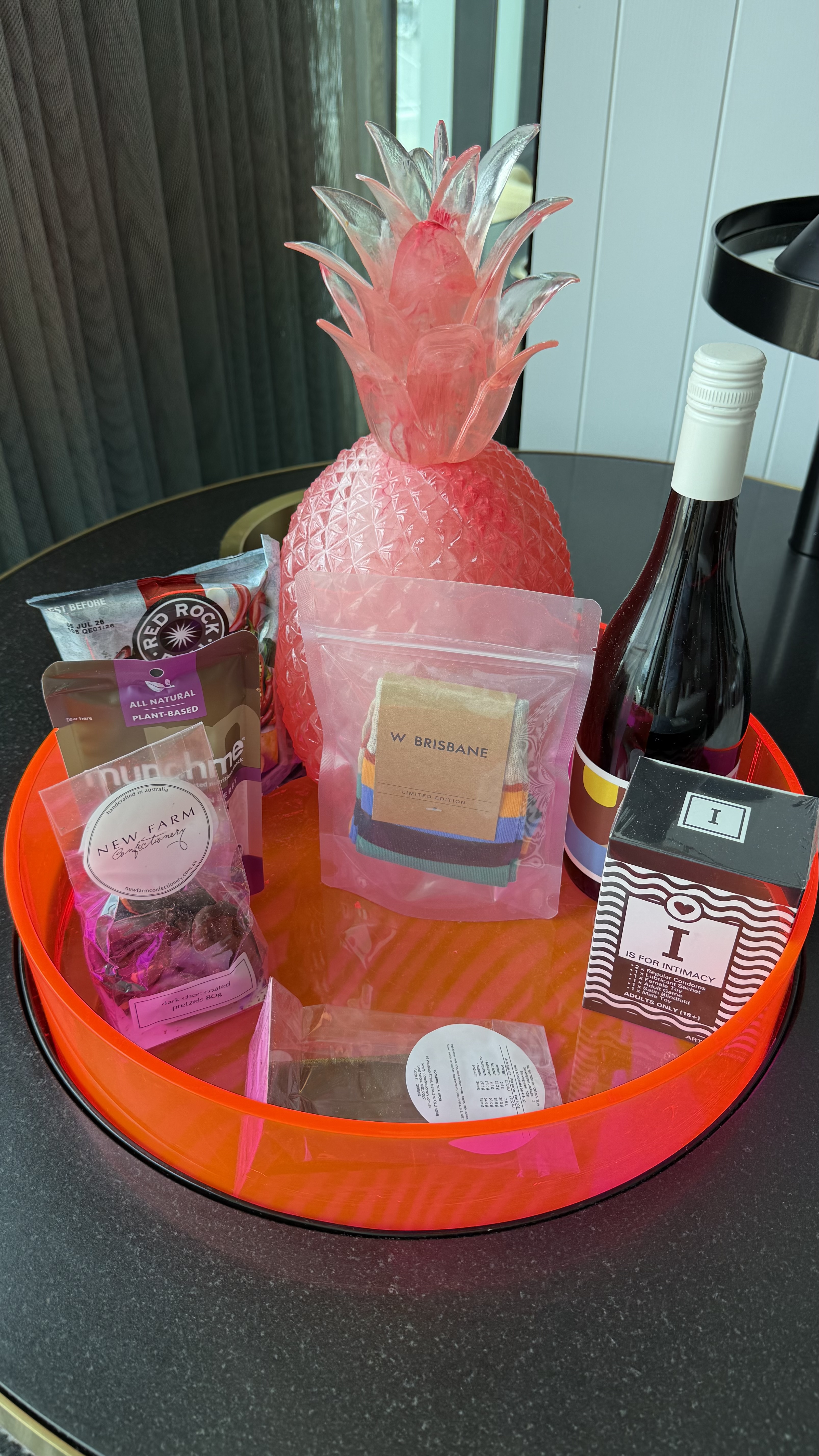 In-room amenity selection — Red Rock Deli, New Farm Confectionery and more
