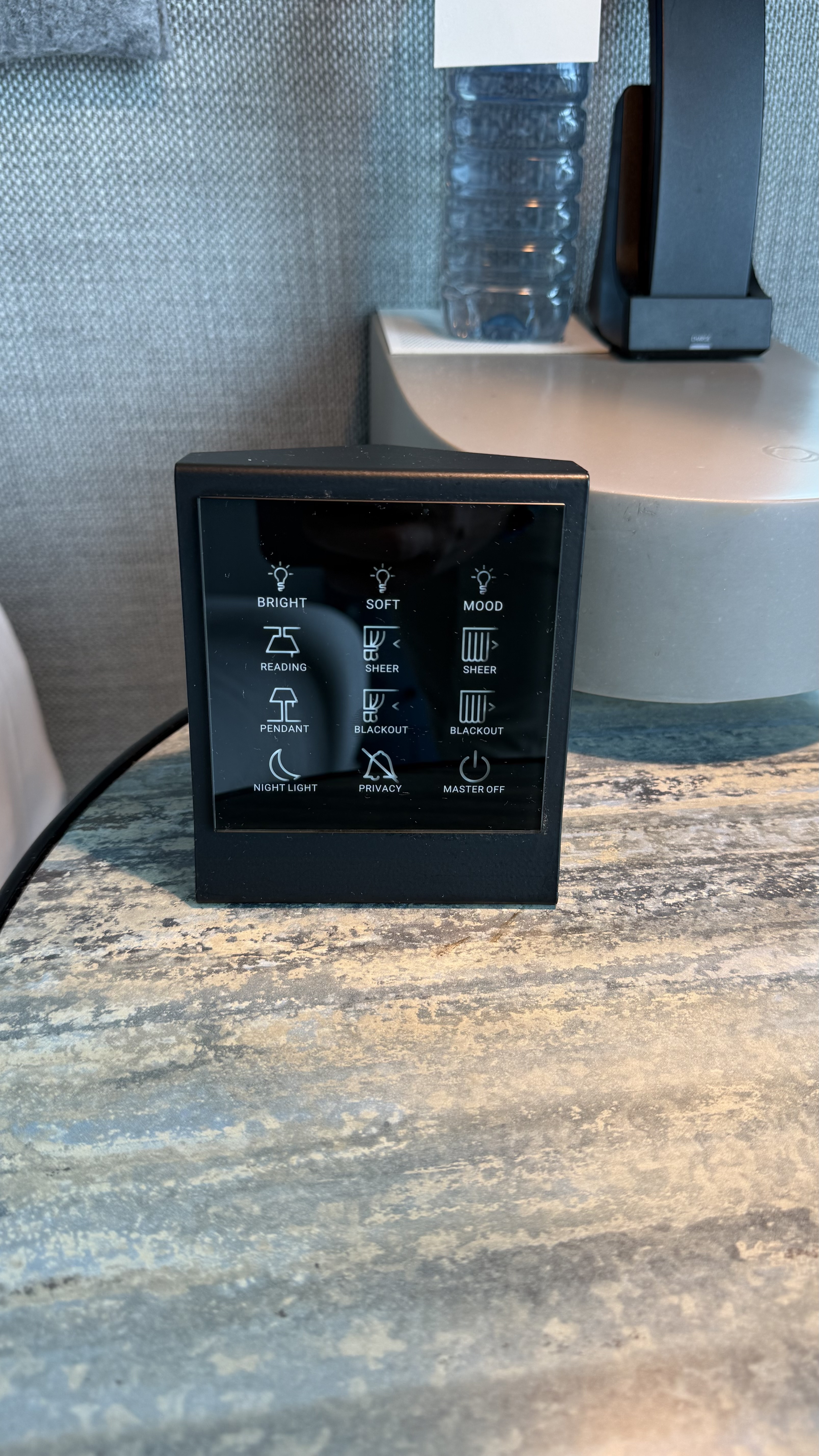 The touchscreen control panel — blinds, lighting modes, privacy and master off