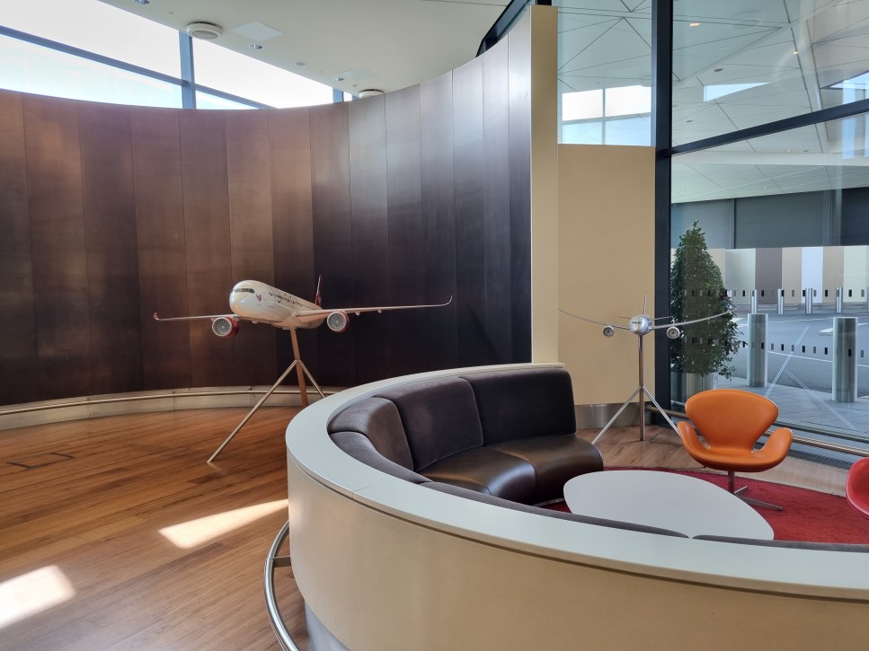 Inside the Upper Class Wing — scale models and the iconic curved lobby