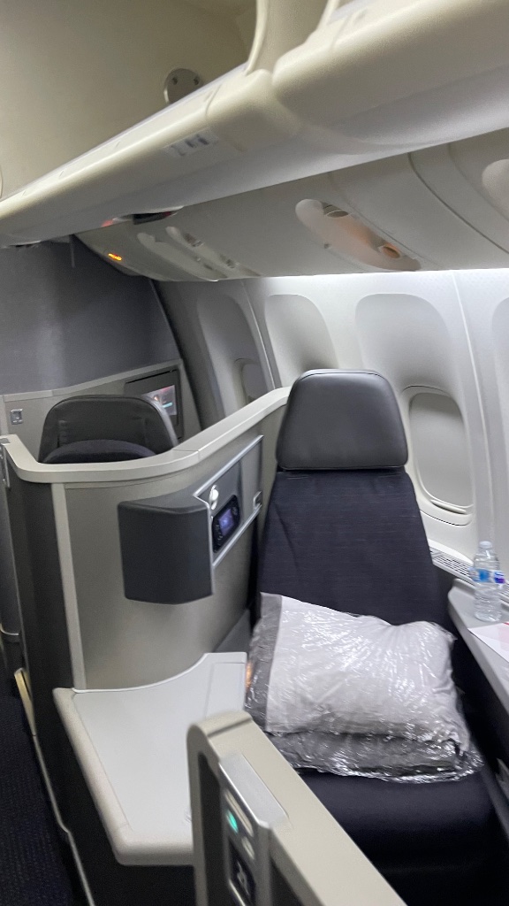 787 Business Class seat — lie-flat, direct aisle access, functional and comfortable
