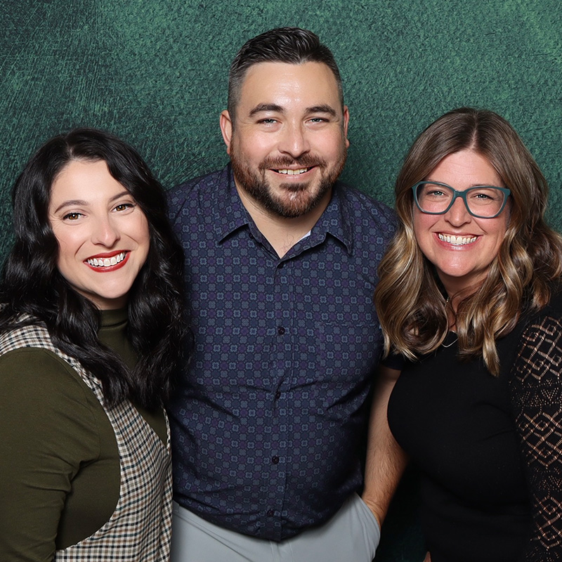 Alex, Dan, and Marcia from Rejoice Booth team