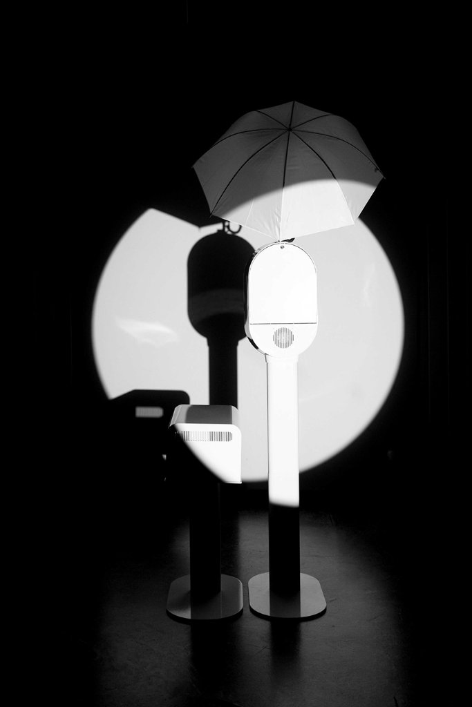 Spotlight photo booth with dramatic overhead lighting Indianapolis