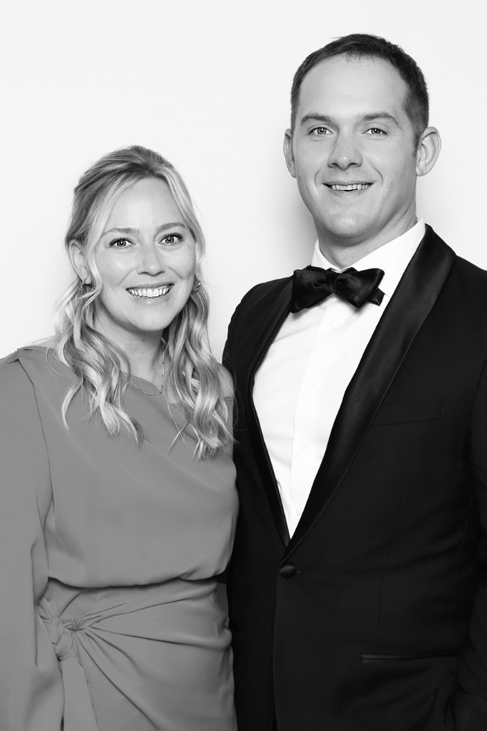 Guests posing at an Indianapolis gala photo booth