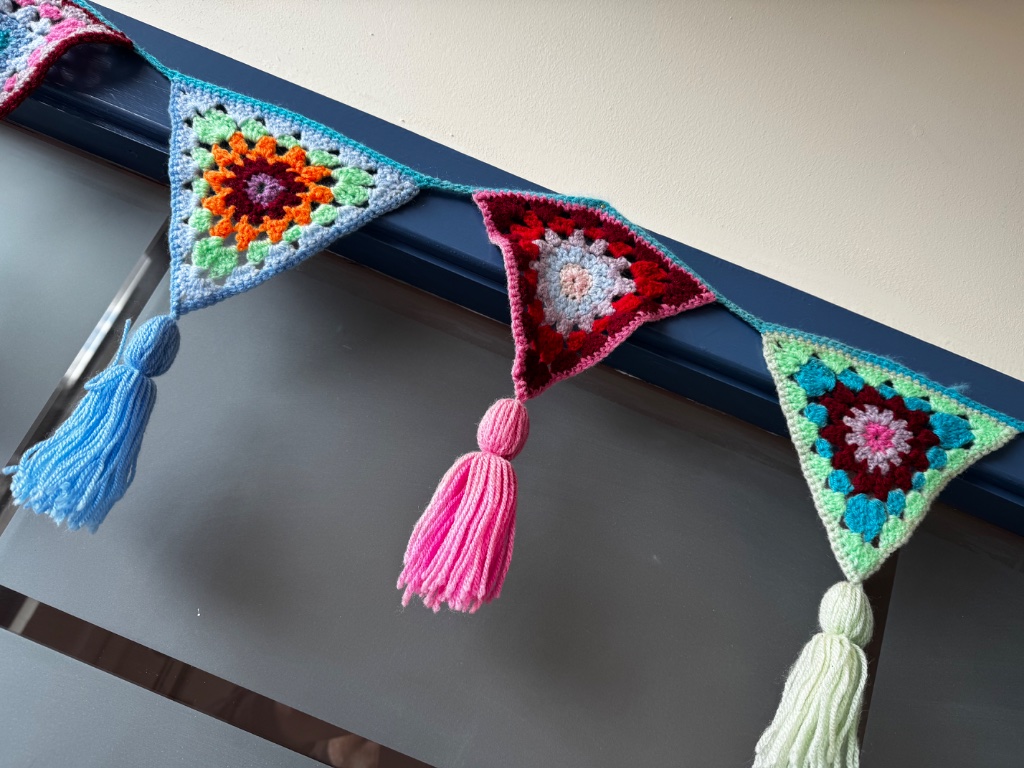 Colourful crochet bunting