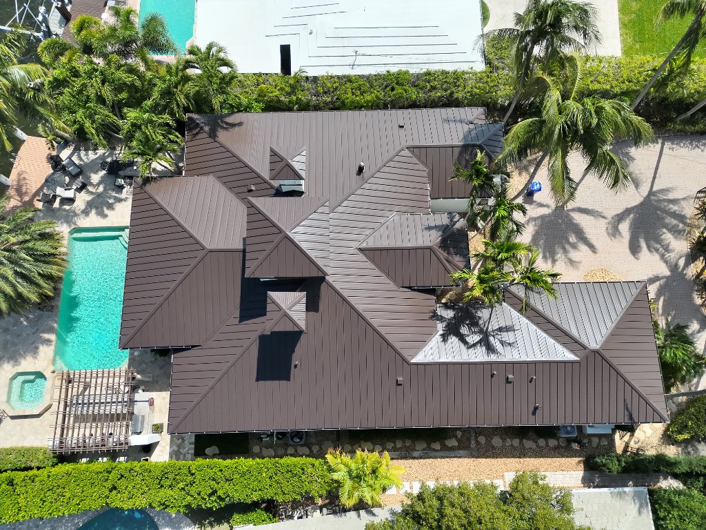Standing seam metal roof replacement Pompano Beach FL — 1.5 inch snap lock Mansard Brown — Coastal Roofing and Waterproofing