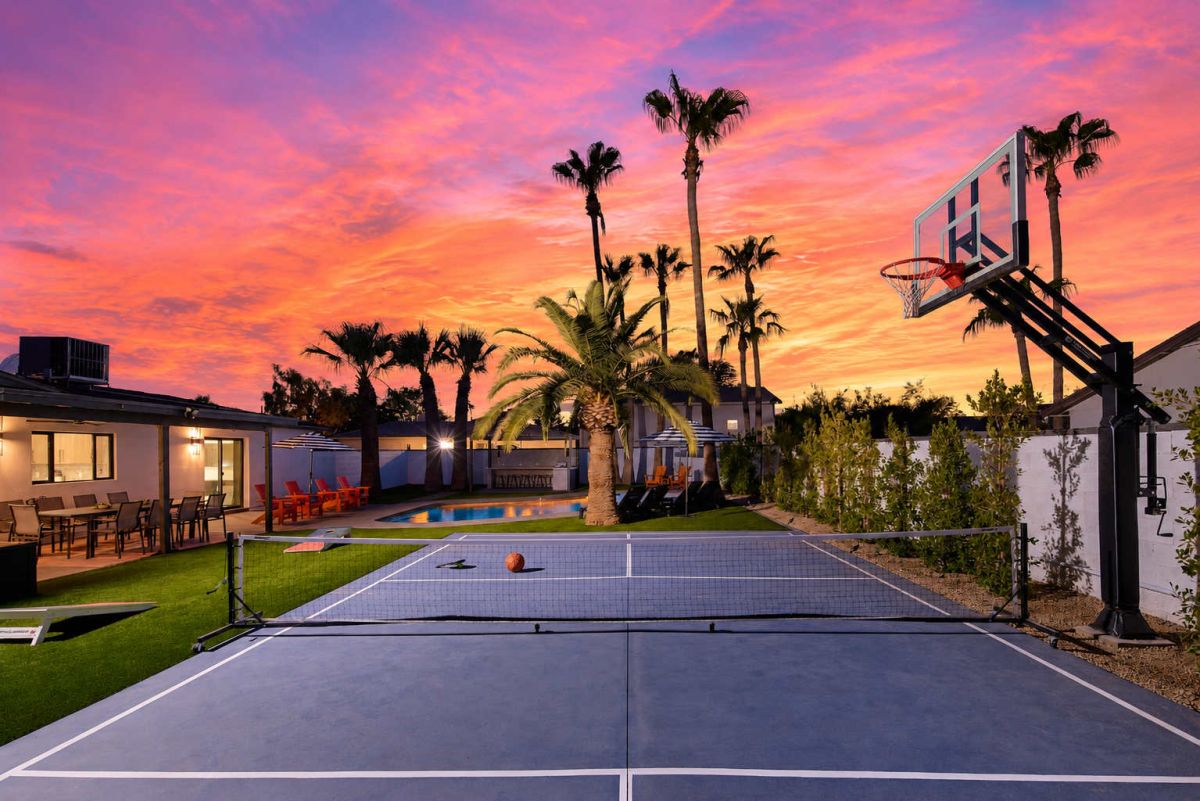 Sunset over court and pool