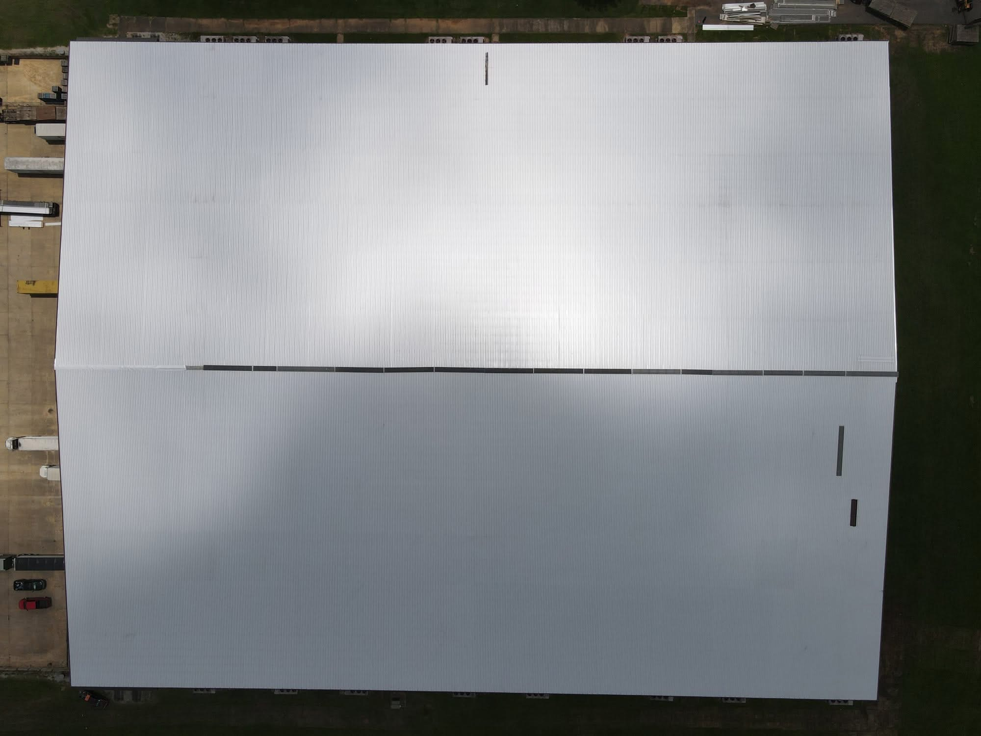 Aerial top-down of the finished commercial metal roof