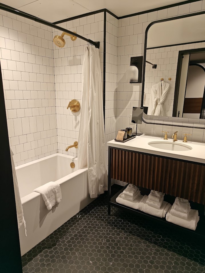 Classic Bathroom with Gold Fixtures and Subway Tile Remodel Bellevue
