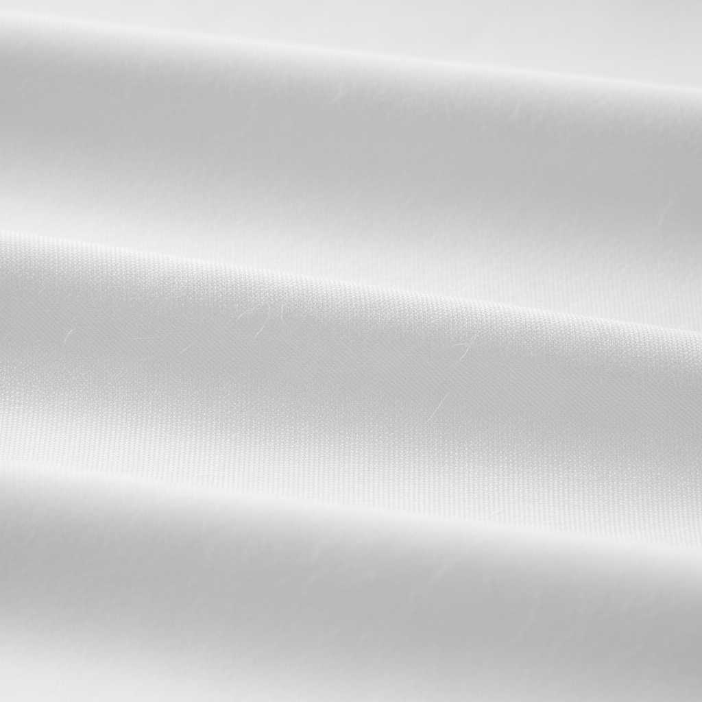 Hotel-quality white luxury sheets on a perfectly made bed