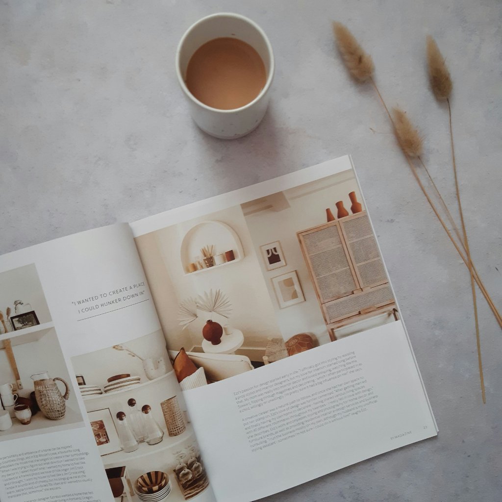 Interior design magazine with coffee