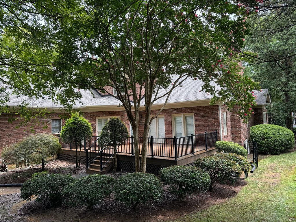 Brown composite deck with black railing