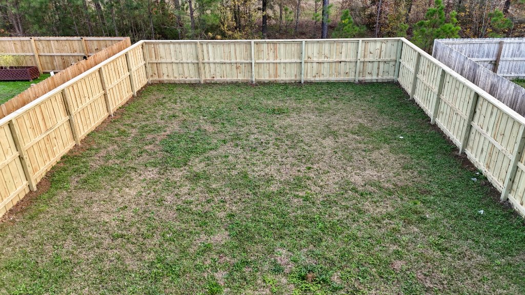 Full privacy fence backyard enclosure