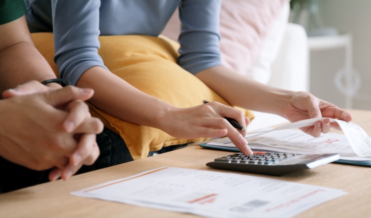 Couple budgeting and planning IVF treatment costs