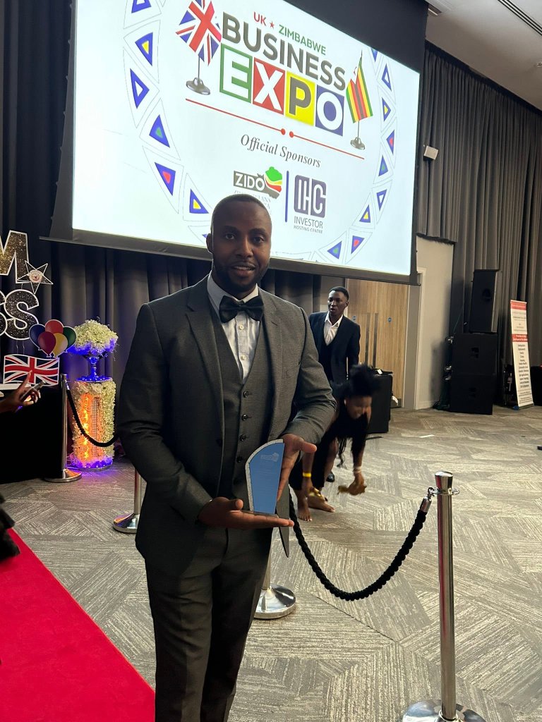 Donald Raisi receiving ZIDO Award at UK Zimbabwe Business Expo