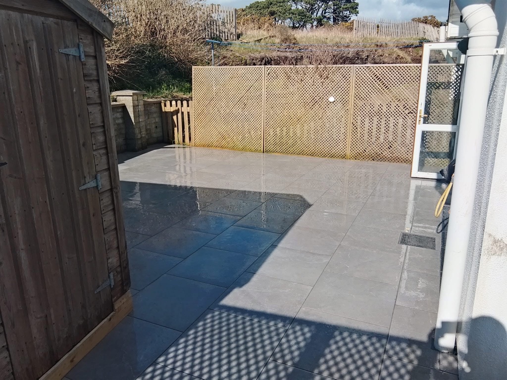 After patio installation — new large format porcelain tiles