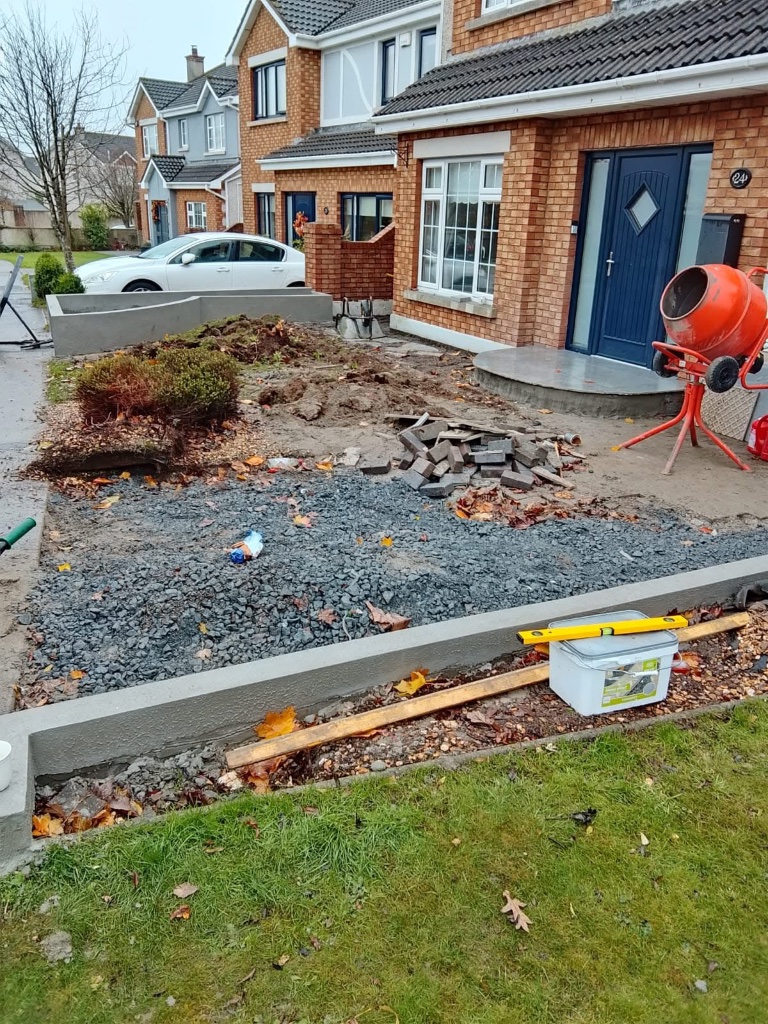 Before driveway installation — excavated front garden ready for tarmac
