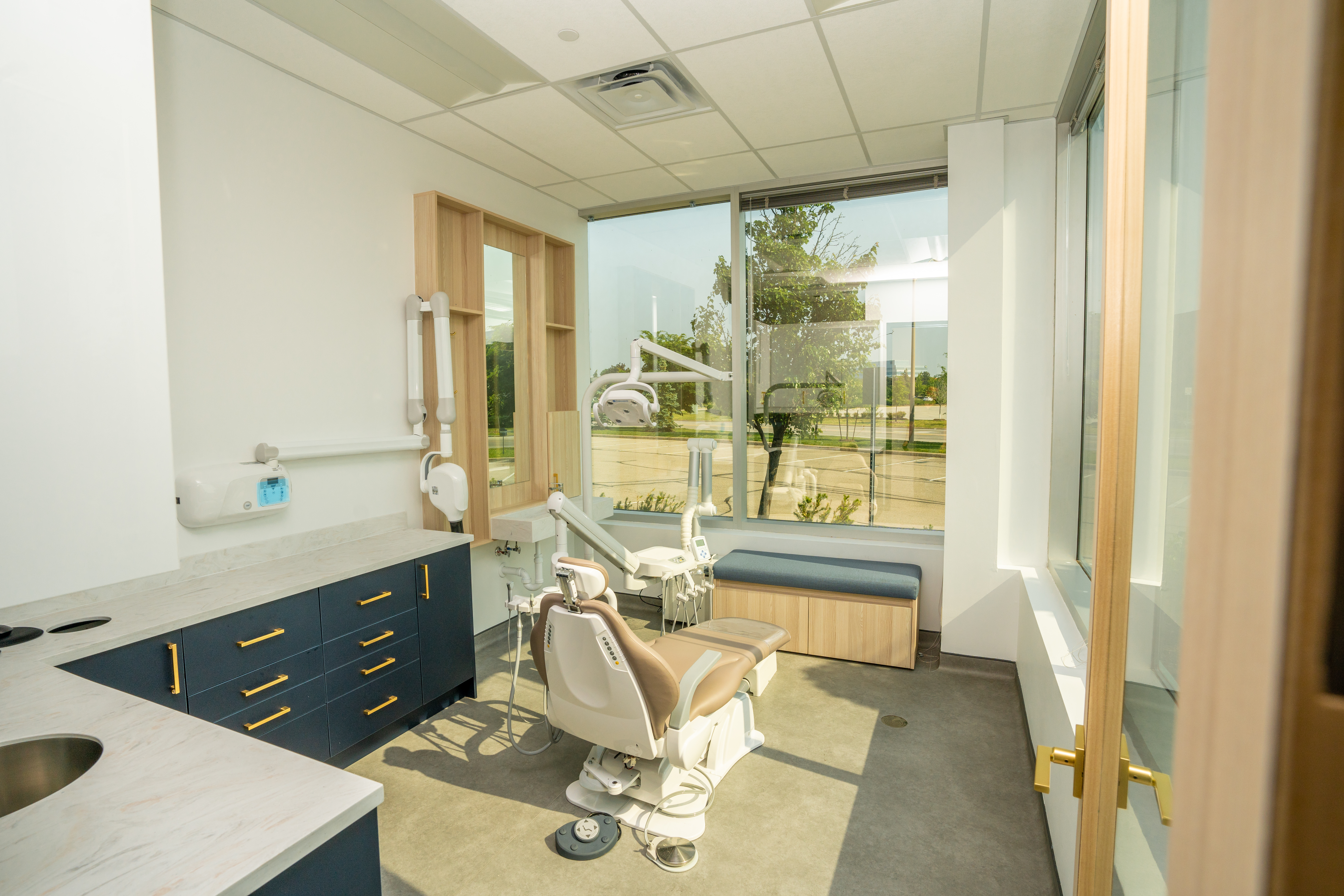DS Dental treatment room with navy cabinetry